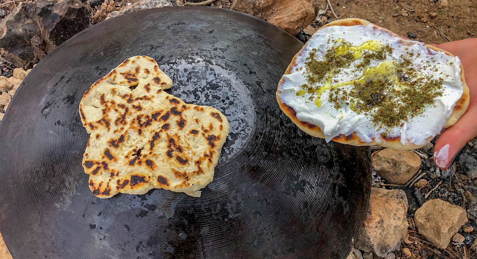 Making pita on a saj